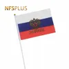 Bannière Drapeaux Handheld Russie Drapeau 14x21cm Polyester Drapeau Imprimé Bannière 30cm Mâts En Plastique Drapeaux Russes pour Célébration Parade Sports G230524