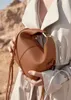 Lüks seyahat beri eyer omuz çantası kadın çanta tasarımcısı bulmaca bulut zinciri moda kozmetik çantalar erkek çanta çanta crossbody sac vintage cyme yaz debriyaj çantaları