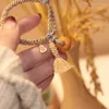 チャームブレスレットJumengyan Mountain Old HoneyWax Pendant Tassel Gourd Weaving Bracelet Fashion Temperament Literature National Style Hand