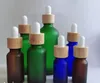 Frostat glas eteriska oljedropparflaskor blå bärnsten grön serumflaska med bambu cap 10 ml 20 ml 30 ml 50 ml 100 ml SN794