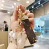 Leather rope Keychain female cute creative Keychain personality car keychain bag hanging ornaments