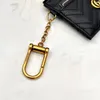 Designer Metal Letter Unisex Nyckel Wallet Womens Mens Zipper Coin Purses With Keyring Wavy Stripe Thin Female Card Holders Designer Väskor Totes Pendant Charms Keychain