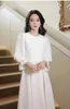Sukienki swobodne 2023 Wiosna jesień kobiet biała sukienka wieczorowa francuska długie rękawie A-line temperament towarzyskie haftowane flary