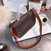 quality old calfskin decorative edge color matching womens bag with large lock fashionable allaround postman bag handba