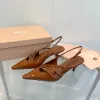2024 Designer di lusso in puro colore sandali con tacco alto da donna scarpe casual in pelle Ladys sexy tacchi a spillo cava open toe sandalo con fibbia a una linea