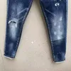 2023 D088 ​​Coolguy Man Jeans Microelástico apresenta uma decoração de bordado com zíper de alto grau Tag de couro pequeno tag de couro