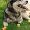 Hundekleidung 4pcs Pet Protector Anti-Fleck leicht atmungsaktiven Welpenschuhen für