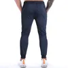 Pantalones de hombre 2023, pantalones elásticos ajustados informales, pantalones de chándal con cordón de retazos de banda elástica a la moda