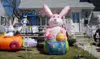 Giant 8ft animated inflatable easter bunny pushing egg cars for outdoor events decoration