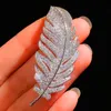 Élégant blanc cristal plume broches couleur argent strass alliage plante broche dame fête épingles de sûreté cadeau