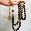 Одежда мусульманский розарий светятся в темно -коричневой цветной смоле Tasbih Beads 51 Beads Man's Misbaha Beades Beads, сделанные ручными кисточками