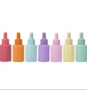 2023New Glass Cosmetic Dropperボトル贅沢な血清ボトル30ml紫色のピンク黄色の青緑の平らな肩