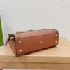 Açık tote çanta çok yönlü kadın çanta crossbody çanta bambu kol tasarım metal logo moda çanta