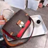 quality old calfskin decorative edge color matching womens bag with large lock fashionable allaround postman bag handba