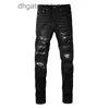 Denim Amiryes Jeans Designerhosen Herrenjeans Herrenmodemarke High Street Schwarz Waschung Messerschnitt Große Beschädigung Slim Elastic SLP Hose mit kleinem Bein 1KZU