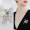 Pinos broches Butterfly fada elfo elfo laço nó luxo coreano novo conjunto de alta ponta Brooch Roupas Versátil Button Gift G220523