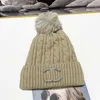 Bonnet/Casquettes tête de mort Chapeau boule de laine chaud design chic pour les femmes en automne et en hiver pour garder le froid coupe-vent avec lettres retournées ENMS tricoté en peluche