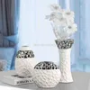 Vasi Europa Decorazione del soggiorno Vaso in ceramica Bianco Argento Motivo traforato Fiore Decorazioni per la casa Ornamento decorativo