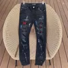 Designerkleidung Amires Jeans Denim-Hosen Amies Black Paint Graffiti mit eingelegten roten Diamanten Stretch-Jeans High Street Zerrissene lange Hosen für Herren und Damen Distressed Rippe