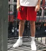 Mäns nya 2022 Muscle Fitness Mesh Snabbtorkning av andningsbasketbasket Shorts som kör ingen gym NCAA University League P230524