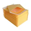 Bolsas de empacotamento 100pcs/lotes bolhas malandades acolchoados envelopes embalagens Kraft Envelope de correspondência 130x110mm Drop Drop Office School Busi DHT7Q