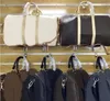 Designer mode duffel väskor lyxiga män pu läder kvinnliga resor läder handväskor stor kapacitet håll i bagage över natten veckor väska