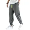 Men's Pants Men Sweatpants Mid-rise Elastic Waistband Trousers Drawstring Pockets Shrinkable Cuffs Loose Wide Leg Jogging