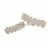 Grillz Griglie dentali Hip Hop Grillz Pave Pink Cz Stone Iced Out Mouth Denti Caps Top Bottom Tooth Set Colore oro Uomo Donna Vampire Dhpy1