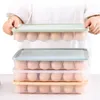収納ボトルXunzhe 24グリッドプラスチック卵カートン冷蔵庫鮮明なポータブルピクニックトレイボックス家庭用キッチン保存