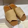 Kvinnors designer tofflor Woody Flat Mule Slide Sandals seglar svart vit oliv beige rött nät broderat präglade linne rosa mode strandskor nr290