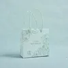 Present Wrap Forest Wedding Gifts till gäster souvenirer grön väska förpackning födelsedagsfest semester chokladpapper 10st