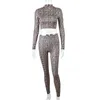 Designers femininos Roupas 2023 Street estilo moda redonda de pescoço traseiro de manga comprida ABRIM