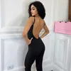 Kvinnors jumpsuits Rompers 2023 Summer Women's New Fashion Hollow Out Strap Open Back Tight Sports Jumpsuit T230525