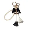 Llaveros creativo Camelia borla llavero bolsa colgante coreano perla cadena ropa coche accesorios moda pequeños regalos
