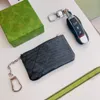 Unisex bayan erkekler tasarımcı anahtarlık moda deri çanta anahtarları g marka mini cüzdan madeni para kredi kartı sahibi erkek aksesuarları