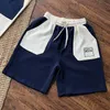 Shorts pour hommes Shorts Top Designer Stitching Against Color Brodé Sports Hommes et même style