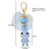 Porte-clés dessin animé mignon flip lapin animal poupée fourrure Pom Poms balle porte-clés femmes sac bijoux voiture clé pendentif G230525