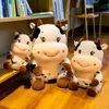 Plush toy, cow doll, doll, sleeping on bed, pillow, cloth doll, cute mascot of the Year of the Ox