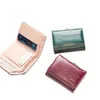 Plånböcker plånbok kvinnor retro designer damer små vikta mynt handväska multifunktion korta pu kvinnliga plånböcker för menväggar