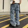 Męskie dżinsy zindywidualizowane dżinsy łaty Mężczyźni i amerykańskie High Street Hip-Hop Fried Street Street Pants Blue Loose Mały tłum mopping 230524