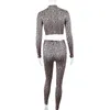 Designers femininos Roupas 2023 Street estilo moda redonda de pescoço traseiro de manga comprida ABRIM
