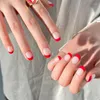 Unghie finte Nero Bianco Modello di colore di colpo irregolare Nail art indossabile Fiori carini Viola Staccabile Premere con colla