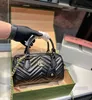Lyxdesigner Cucci Handväskor Marmonts Classic Tote Bag Kvinnlig hög kapacitet Crossbody Bag axel Lady Wallet Messenger Handväska 27 cm