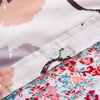 女性用のポケット付きのシックな花柄の長袖シャツ - 暑い気候に最適