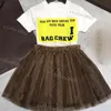 Nieuwe luxe designer Kids T-shirt Veil Rok mode Brits modiemerk Summer Childrens Treasures en Girls Cotton Tweed-delige luxe ontwerper Hoodie Rok Tops