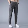 メンズパンツトレンディな男性夏のズボンスリムフィットミッドウエストスーツストレートソフトガーメント