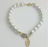 2023フルダイヤモンドホースシューバックル、ハイエンド、誇張された女性用のネックチェーンアクセサリーを備えた大きな真珠のネックレス