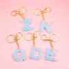 Keychains schattige kralen A-Z Letter Blue Acryl Metal Dames Bag Pendant Keychain Bracket Charm Sieraden Accessoires G230525