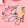 Keychains Trendy Crystal Glass Heart Keychain Kvinnor Dry Blommakedja Kedja Rope Lanyard Bell Bag Charms Pendant Car Keyring Jewelry