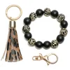 Porte-clés 1 pièces noir et blanc marquages porte-clés bois perles dragonne Bracelet pour femmes clés Pu cuir porte-clés bijoux cadeaux